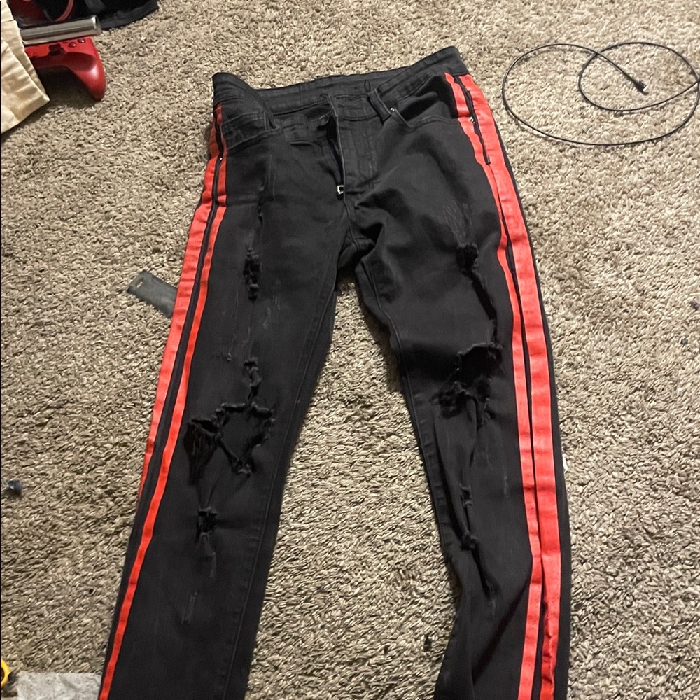 AMIRI Black Skinny Jeans with Red Accents